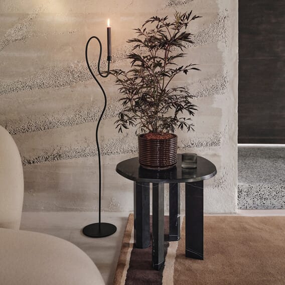 fermLIVING_AW24_ValseFloorCandleHolder_Black_1104269850_TaulaSideTable_Black_1104270182_CorduroyPot_CarobBrown_1104270075.jpg